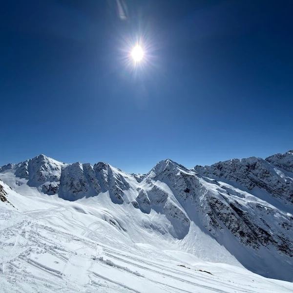 Mountain panorama with fresh snow and sunshine
